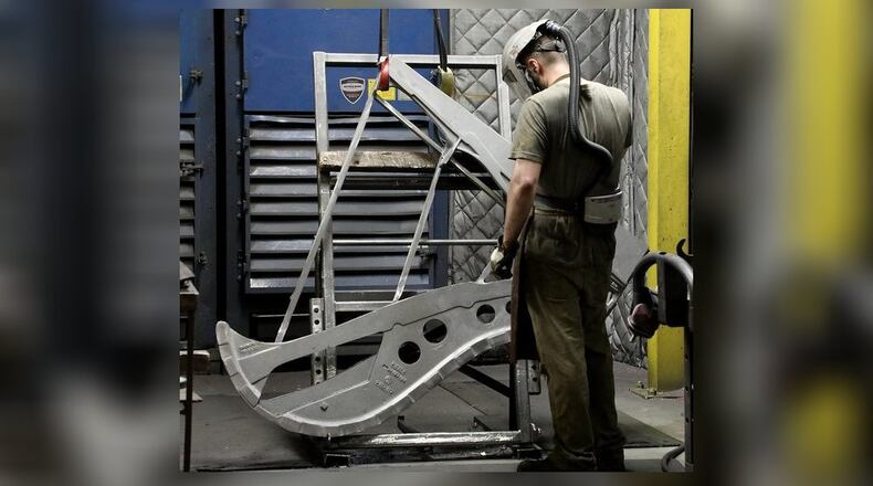 The O.S. Kelly Company in Springfeild has been in business since 1852 and makes piano harp plates for Steinway and Sons Pianos. BILL LACKEY/STAFF