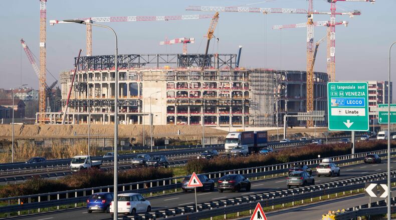 FILE - Construction continues at the Milano Santagiulia Ice Hockey Arena for the Milan Cortina 2026 Winter Olympics in Assago, near Milan, Italy, Wednesday, Jan. 15, 2025. (AP Photo/Luca Bruno, File)