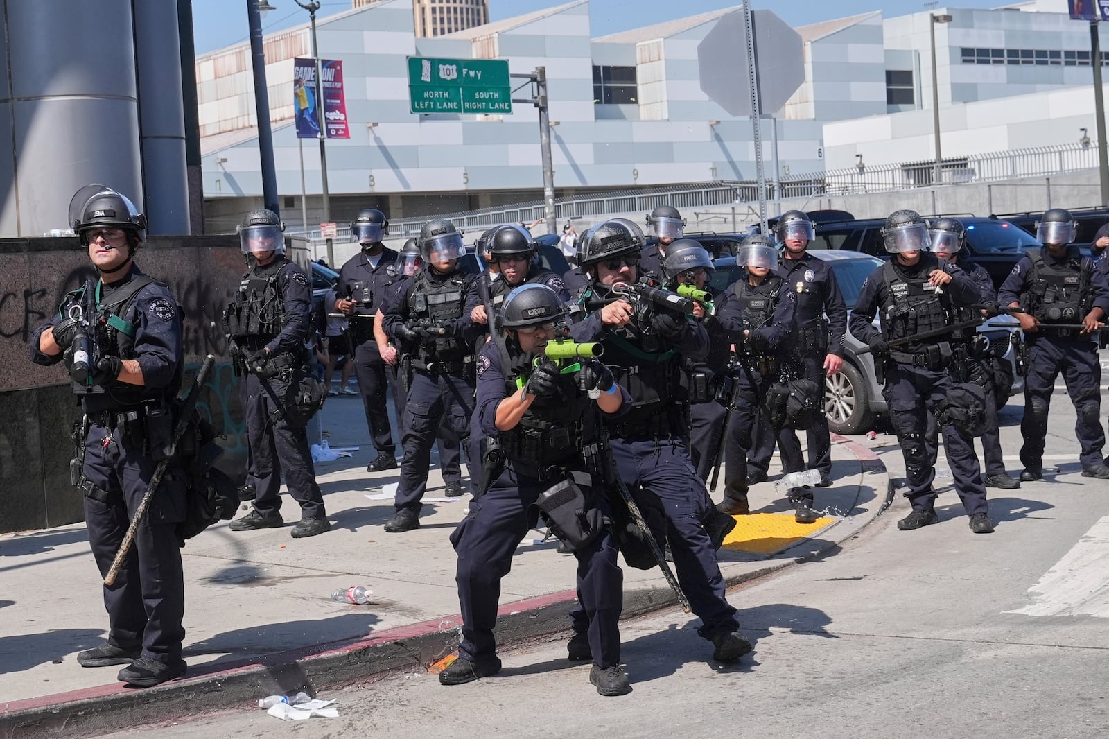 FILE - Police defend the Metropolitan Detention Center in downtown Los Angeles, Sunday, June 8, 2025, following last night's immigration raid protest. (AP Photo/Jae Hong, File)