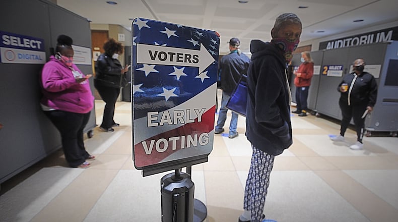 Long lines greeted voters at the Montgomery County Board of Elections on Tuesday, Oct. 6, 2020, as early voting began for last year's November general election. MARSHALL GORBY/STAFF
