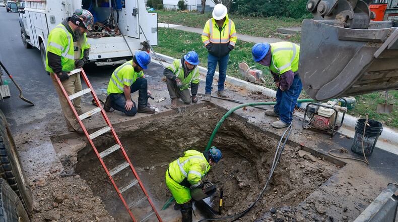 The City of Springfield Water Department spent the afternoon Wednesday, Dec. 4, 2024 repairing a water main break on East Northern Avenue. BILL LACKEY/STAFF