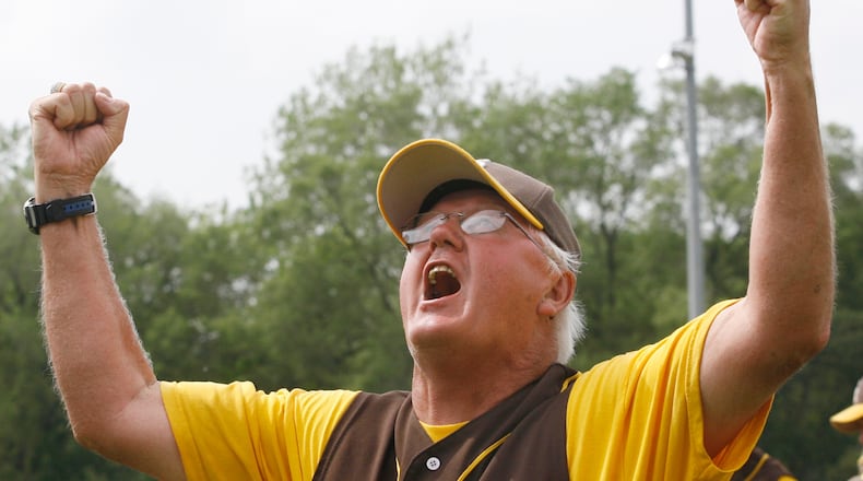 Assistant Kenton Ridge baseball coach Andy Fitzwater reacts to a 17-7 win over Columbus St. Francis DeSales in the Division II regional championship baseball game Friday, May 30, 2008, at Carleton Davidson Stadium.
Staff Photo by Barbara J. Perenic
