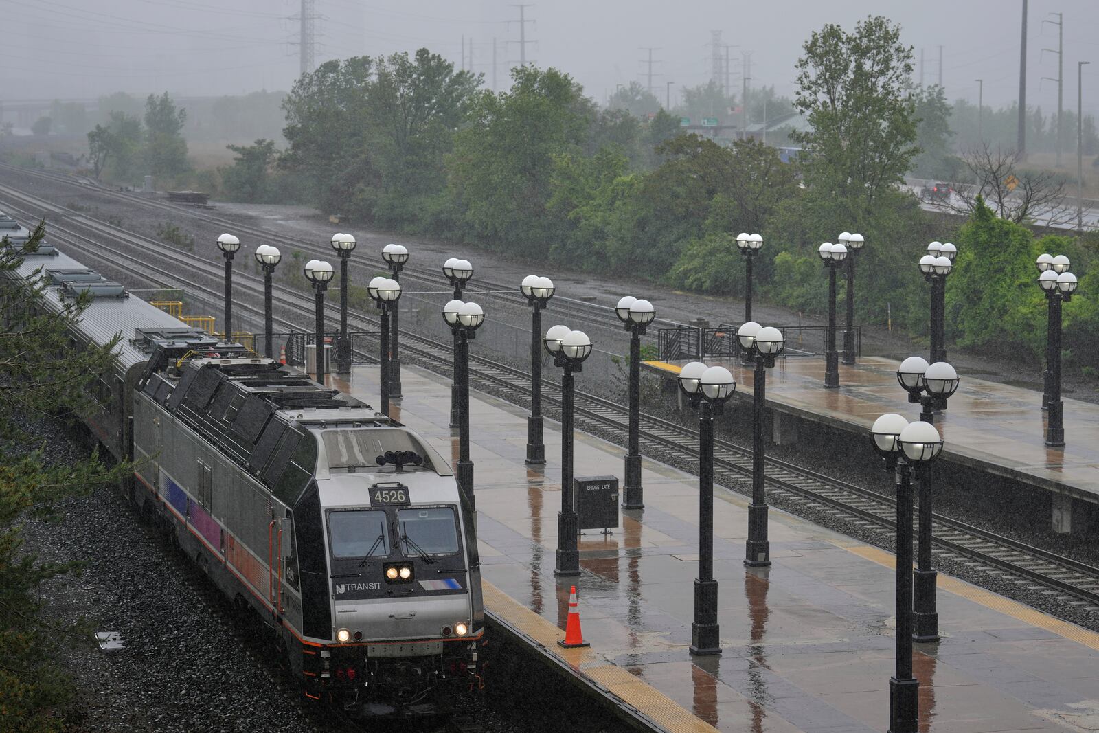 An NJ Transit train pulls into the Secaucus Junction station in Secaucus, N.J., Wednesday, May 14, 2025. (AP Photo/Seth Wenig)