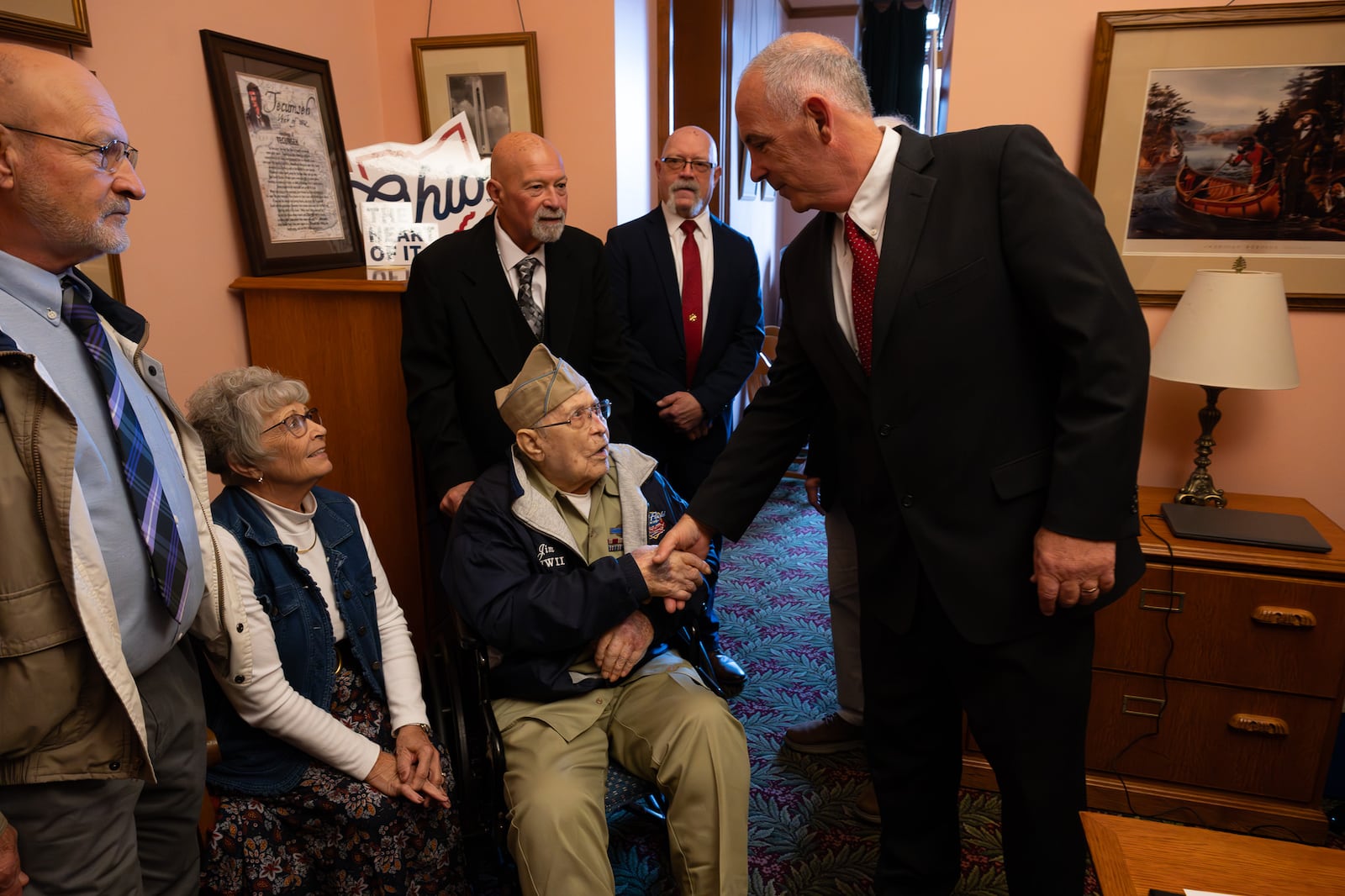 Jim Erisman, a 99-year-old World War II veteran from Farmersville, shakes hands with Sen. Steve Huffman, R-Tipp City. Erisman was honored by the Ohio Senate on Nov. 19, 2025. Courtesy Matt Shadle, Ohio Senate.