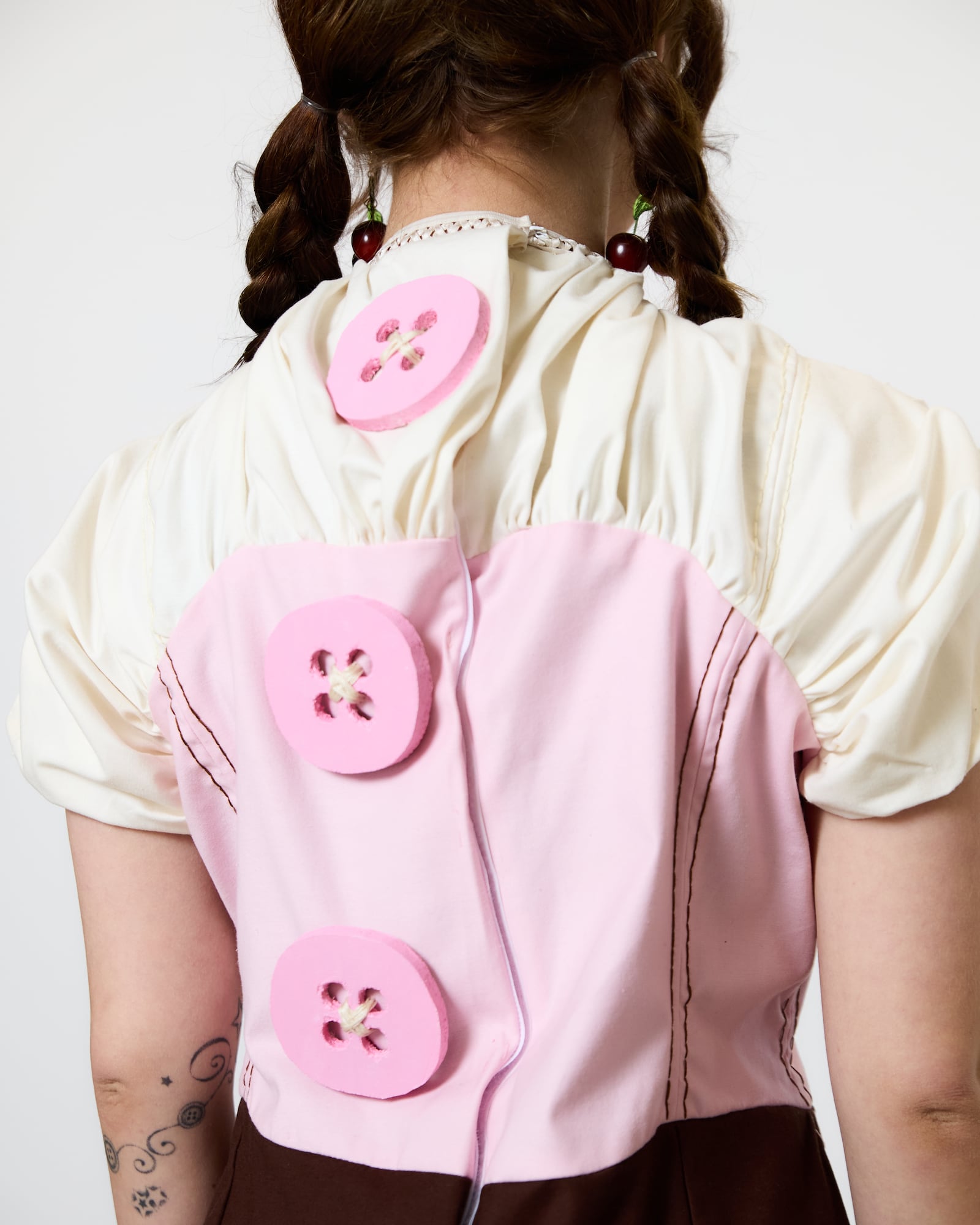 A detail of wooden buttons on a design created by Kendall Brock, who recently graduated in Fashion Design at CCAD. MOLLY DUNN/CONTRIBUTED PHOTO