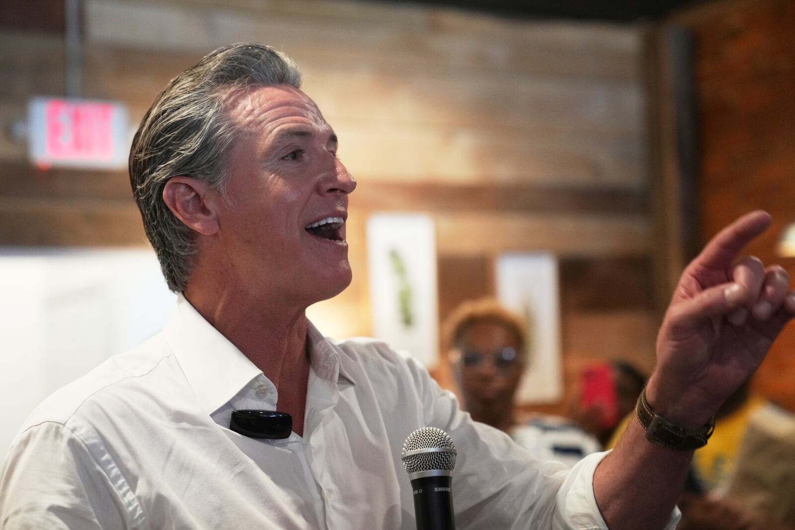 Gov. Gavin Newsom, D-Calif., addresses a crowd at a coffee shop during a two-day swing through South Carolina on Tuesday, July 8, 2025, in Mullins, S.C. (AP Photo/Meg Kinnard)