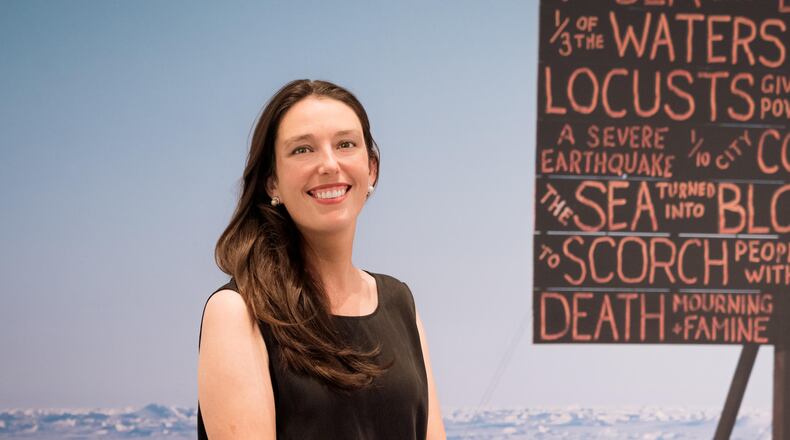 Katherine Ryckman Siegwarth is pictured at the opening reception of the FotoFocus curated exhibition, On the LIne: Documents of Risk and Faith, at the Contemporary Arts Center in Cincinnati. A former curator at the Dayton Art Institute, she is currently director of the FotoFocus Biennial.  JACOB DRABIK/PHOTOGRAPHER