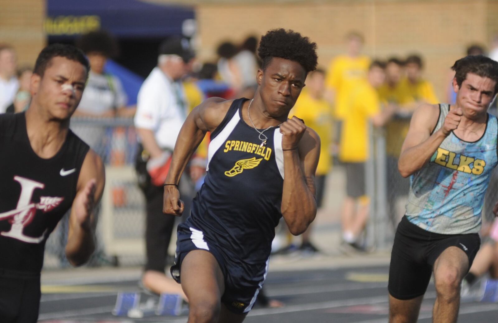 Springfield High School junior Quincy Scott competed in the 200 (pictured), long jump 4x100-meter relay and 100 during the first day of the GWOC track and field championships at Troy’s Memorial Stadium on Wednesday, May 10, 2017. MARC PENDLETON / STAFF