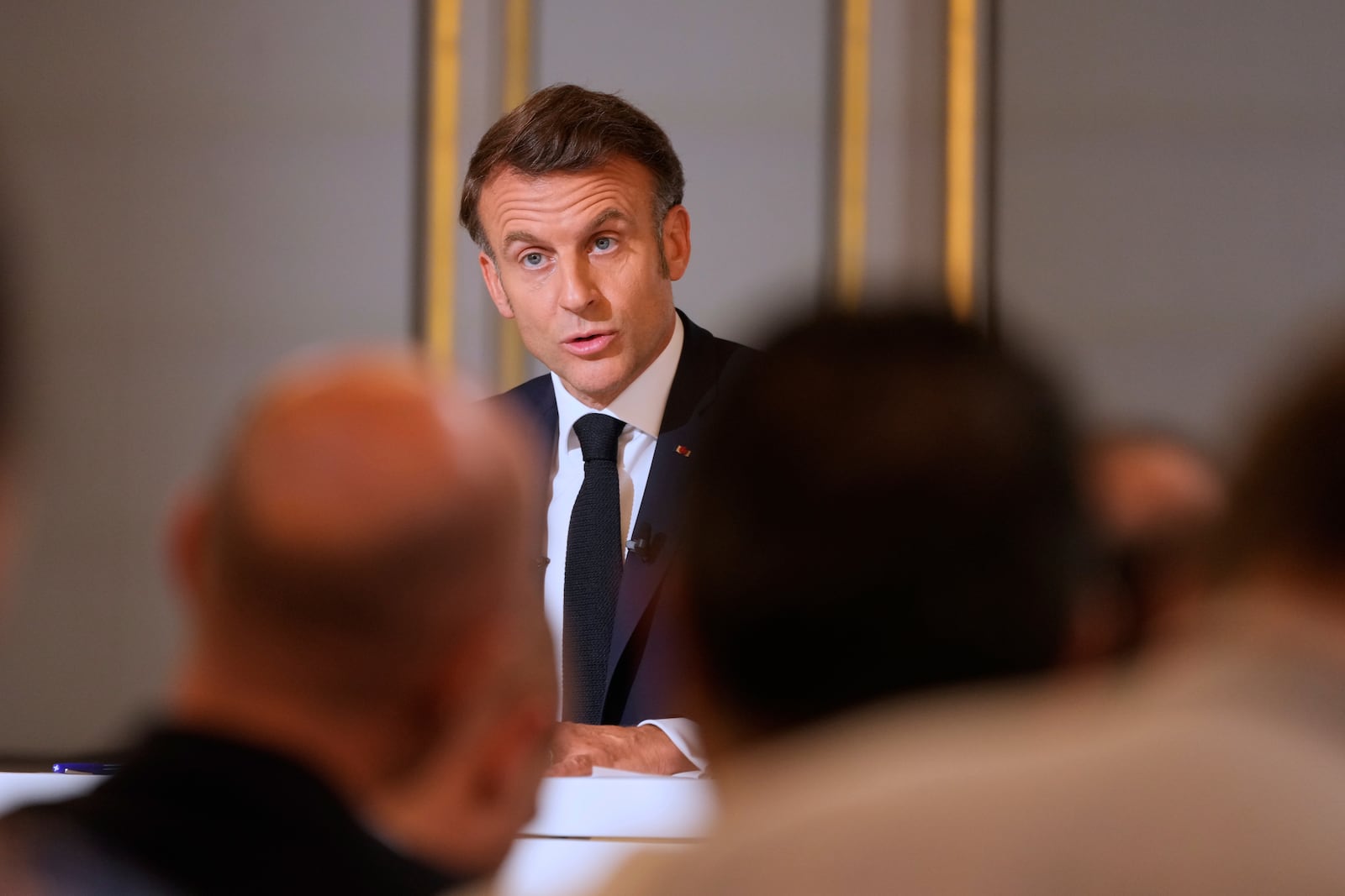 French President Emmanuel Macron holds a news conference at the Elysee Palace, in Paris, Friday, June 13, 2025. (AP Photo/Michel Euler, Pool)