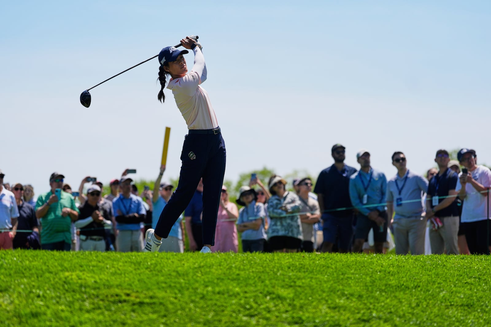 Celine Boutier, of France, hits off the 15th tee during the final round of the Mizuho Americas Open LPGA golf tournament, Sunday, May 11, 2025, in Jersey City, N.J. (AP Photo/Seth Wenig)