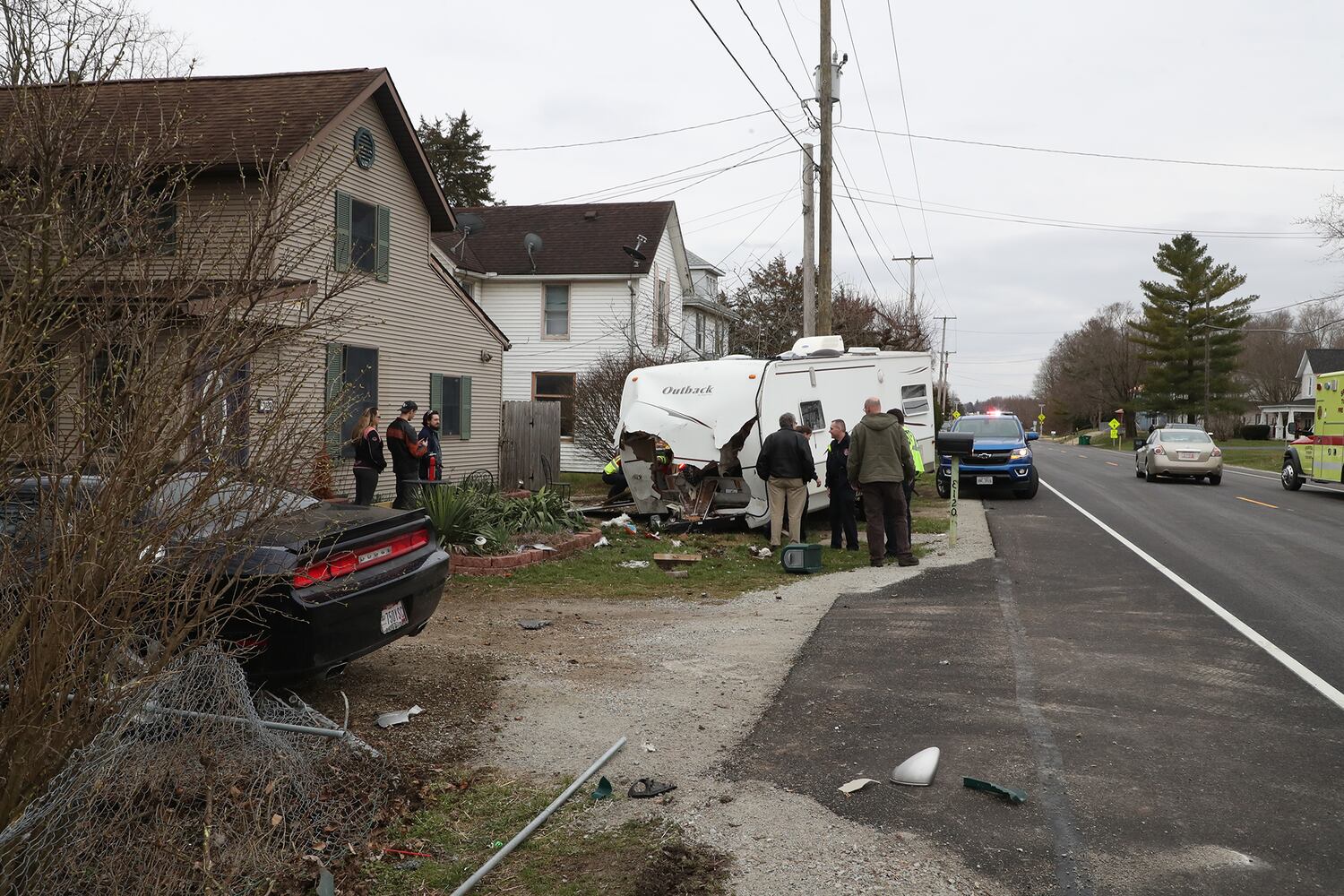 PHOTOS: Porsche Crashes Through Camper