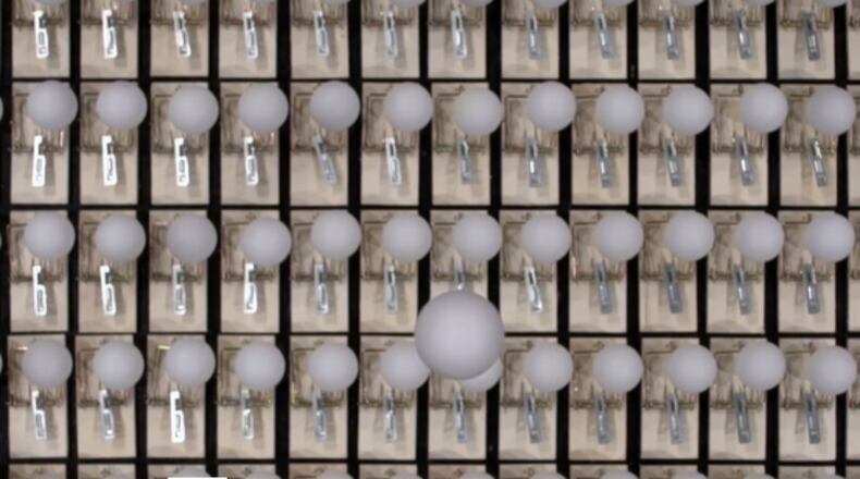 Each trap has its own ping pong ball precariously balanced on top. As the single ball drops, it sets off a chain reaction, causing the balls to fly in all directions. One small ball caused a ripple effect of chaos and destruction.