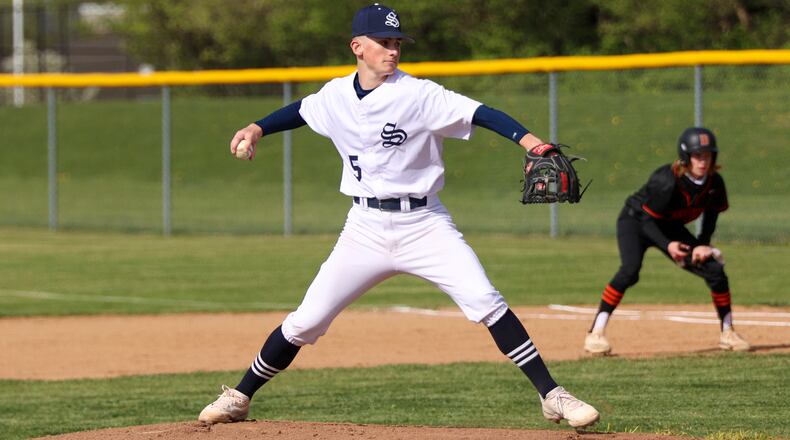 Springfield High School senior Austin Rhodes motions towards the plate during their game against Beavercreek last season in Springfield. CONTRIBUTED PHOTO BY MICHAEL COOPER