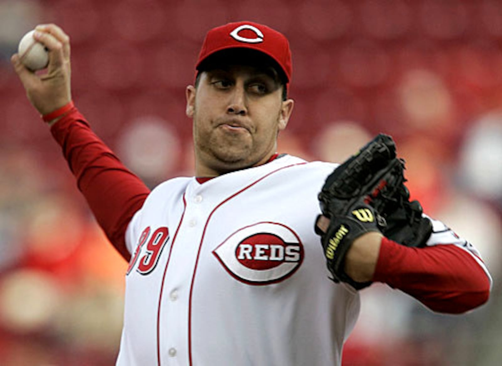Cincinnati Reds pitcher Aaron Harang pitches against the Florida Marlins in the first inning of a baseball game, Monday, May 12, 2008, in Cincinnati.