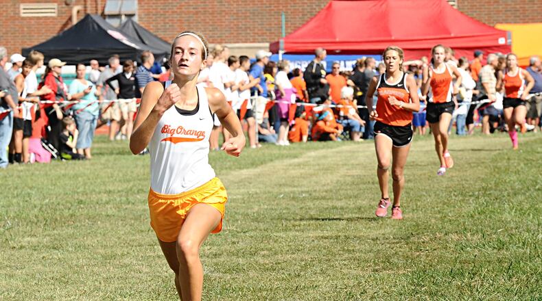 West Liberty-Salem sophomore Grace Adams finished third at Saturday’s Bob Schul Invitational in 19:59.4, behind Minster’s Emma Watcke (19:09.4) and Kaitlynn Albers (19:52.1) — impressive considering Minster runners claimed five of the top seven positions in the Division II-III small school division. GREG BILLING / CONTRIBUTED