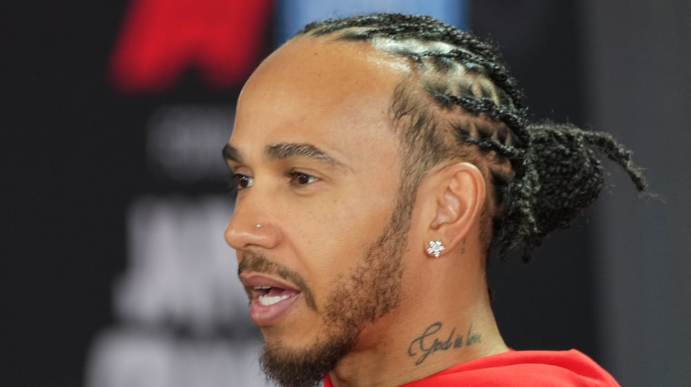 Ferrari driver Lewis Hamilton of Britain speaks with media prior to the Japanese Formula One Grand Prix Thursday, March 26, 2026, in Suzuka, central Japan. (AP Photo/Eugene Hoshiko)