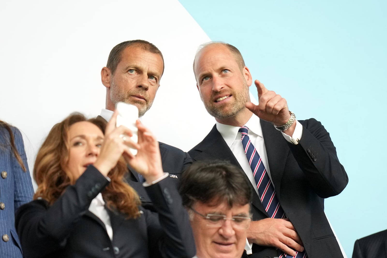 Britain's Prince William speaks to UEFA president Aleksander Ceferin, left, before the Women's Euro 2025 final soccer match between England and Spain at St. Jakob-Park in Basel, Switzerland, Sunday, July 27, 2025. (AP Photo/Alessandra Tarantino)