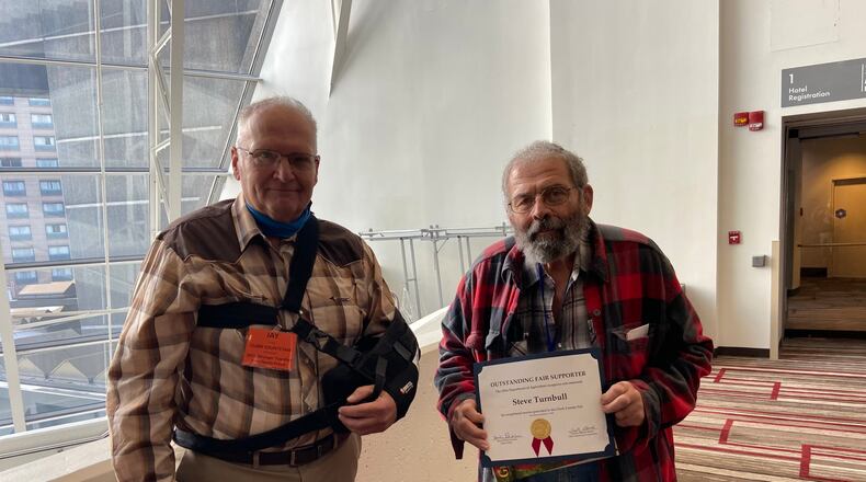 Steve Turnbull was recognized at the 97th Ohio Fair Managers Association annual convention this month. Fair Board President Jay Flax attended the award ceremonies honoring Steve. Photo provided by the Clark County Agricultural Society.