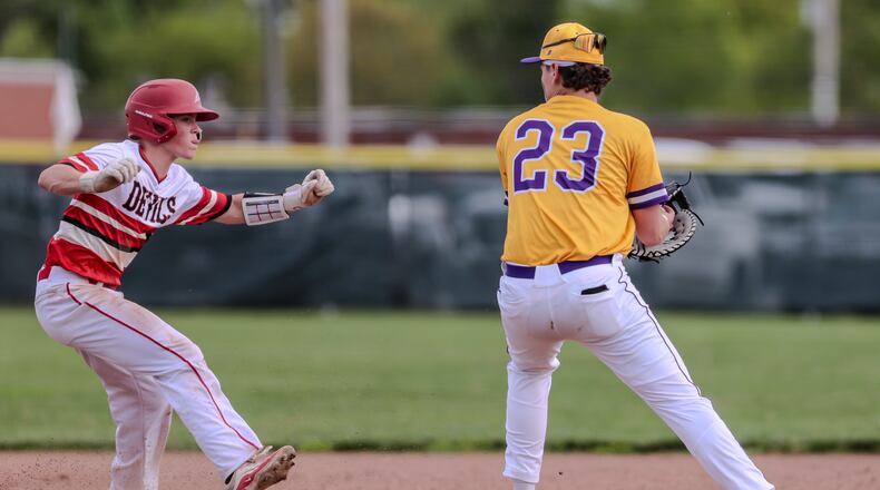 Butler High School senior Mason Reckner tags out Tippecanoe sophomore James Merry during their Miami Valley League Miami Division earlier this season at Upper Valley Medical Center Sports Complex in Tipp City. MICHAEL COOPER / STAFF PHOTO