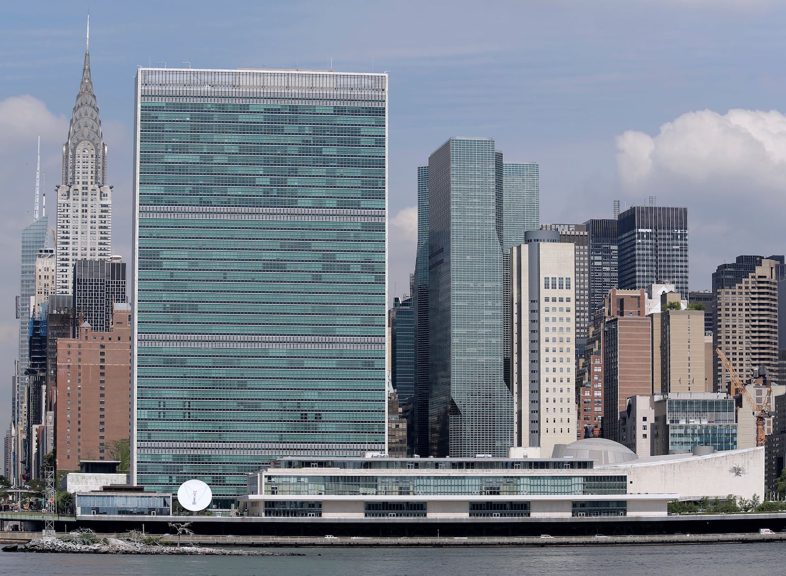 FILE - United Nations headquarters is seen from the Queens borough of New York, July 31, 2018. (AP Photo/Seth Wenig, File)