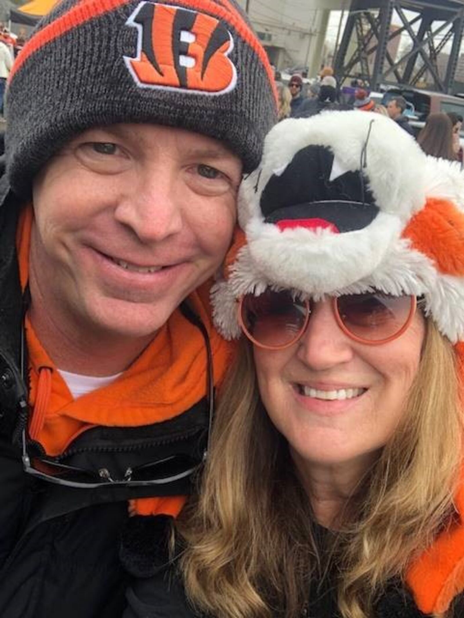 Lifelong Bengals fan Tracy Logan (right), of Germantown, will be at Paul Brown Stadium on Saturday, Jan. 15, 2022, with her fiancé Mike Neri, sister, brother-in-law, son and nephews to watch the Cincinnati Bengals take on the Las Vegas Raiders in the AFC Wild Card Game. CONTRIBUTED