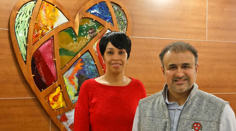 Dr. Muhammed Ashraf and heart attack survivor LaTeisha Pope at the Springfield Regional Medical Center Friday, Feb. 9, 2024. BILL LACKEY/STAFF