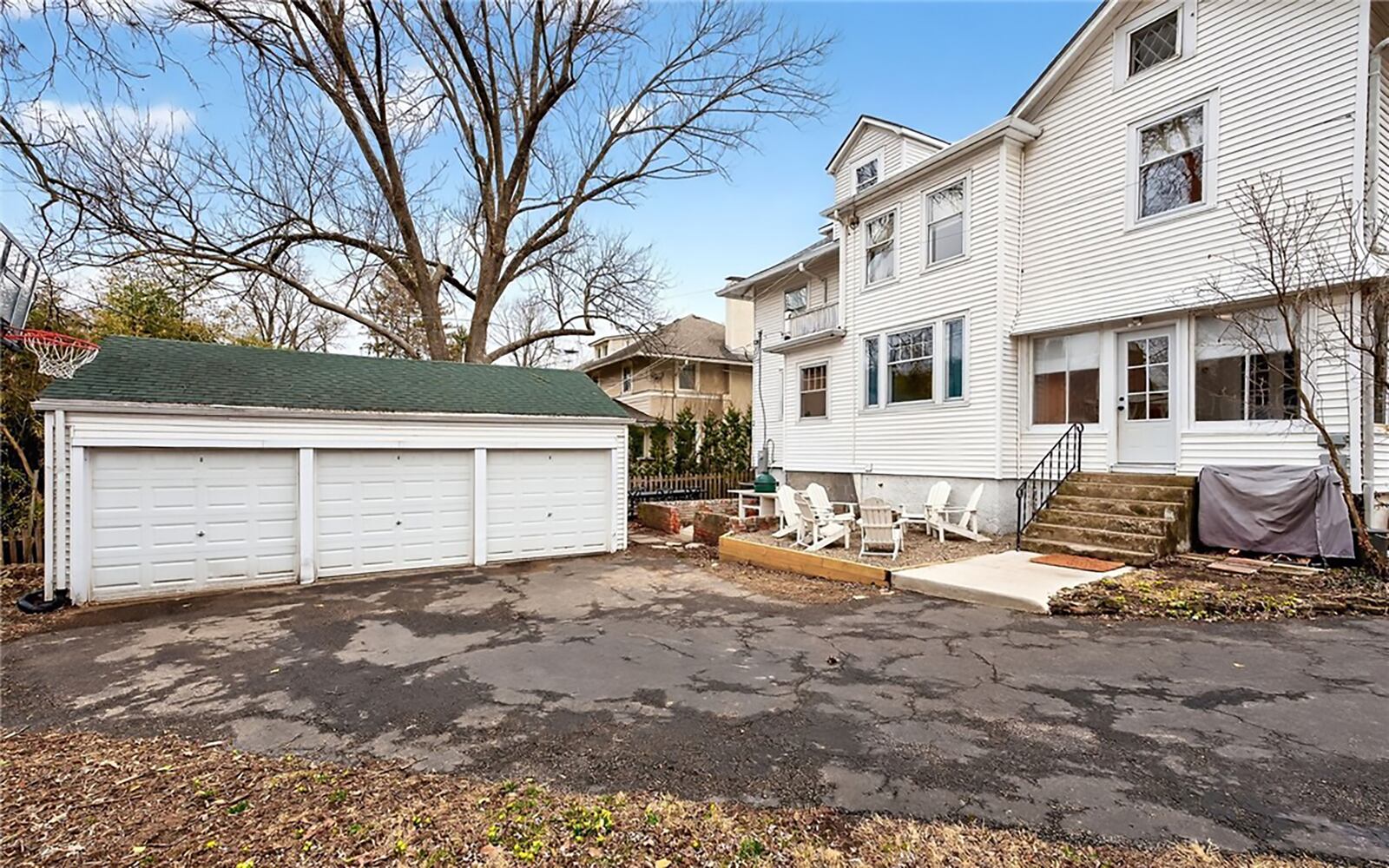 The detached three car garage is in the back yard, which is fully fenced with wood pickets. There is a firepit and a new concrete patio near the house. CONTRIBUTED