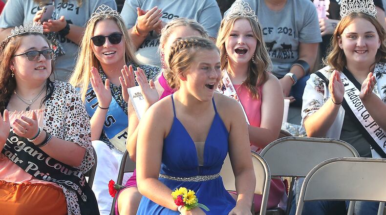 Lauran Bailey reacts as her name is announced as the 2021 Champaign County Fair Queen on Sunday evening. BILL LACKEY / STAFF