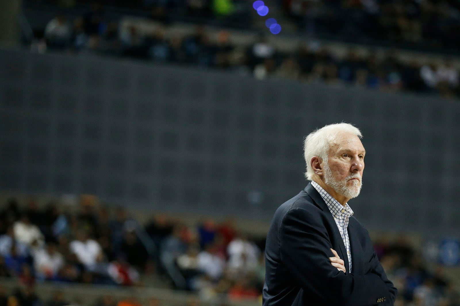 FILE - San Antonio Spurs head coach Gregg Popovich looks on during the second half of their regular-season NBA basketball game against the Phoenix Suns in Mexico City, Saturday, Dec. 14, 2019. (AP Photo/Rebecca Blackwell, File)