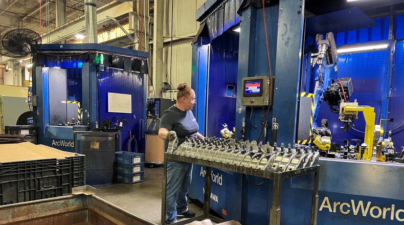 A worker at McGregor Metal's Leffel Lane facility on Wednesday. The company is looking to hire 50 more people over an eight month period. Hasan Karim/Staff