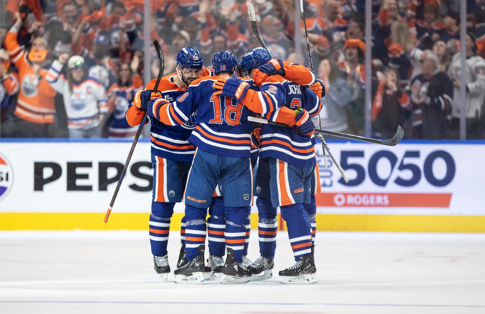 Edmonton Oilers players celebrate a goal against the Los Angeles Kings during the third period of an NHL playoff game in Edmonton on Sunday, April 27, 2025. (Jason Franson/The Canadian Press via AP)