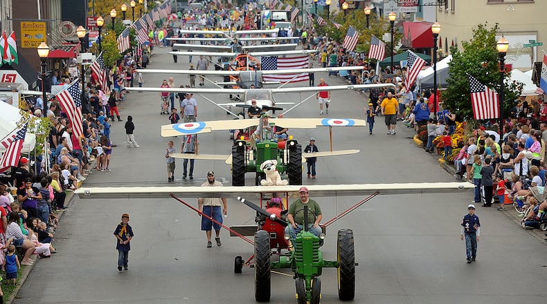 The parade of planes at the New Carlisle Heritage of Flight Festival. MARSHALL GORBY / STAFF