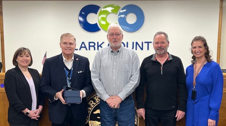 Jim and John Bobo were selected as Clark County luminaries for their contributions to New Carlisle. From left to right, Commissioner Sasha Rittenhouse, Commissioner Lowell McGlothin, Jim Bobo, John Bobo and Commissioner Melanie Flax Wilt. CONTRIBUTED