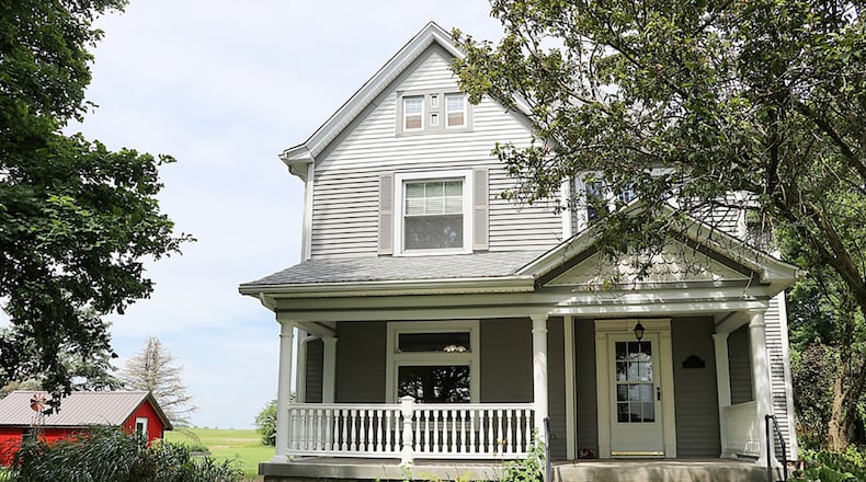 The 6.16-acre property includes the 4-bedroom the farmhouse built in 1907 as well as a 34-by-24-foot metal barn with electric, concrete floor and oversized overhead door. There is also a cinderblock, 2-car garage, a metal garden shed and an old livestock barn and silo. CONTRIBUTED PHOTO BY KATHY TYLER