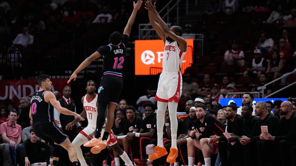 Houston Rockets forward Kevin Durant (7) shoots against Miami Heat guard Dru Smith (12) during the first half of an NBA basketball game in Houston, Saturday, March 21, 2026. (AP Photo/Ashley Landis)