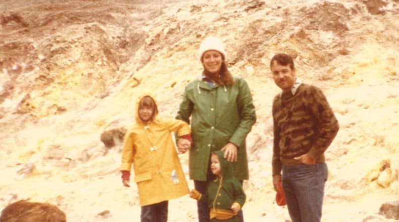 Pam and Rusty Cottrel and daughters Katy and Liz at the yellow sulfur vents near Halemaumau crater of Kilauea. It was at 4000 feet and chilly. PAM COTTREL/CONTRIBUTED