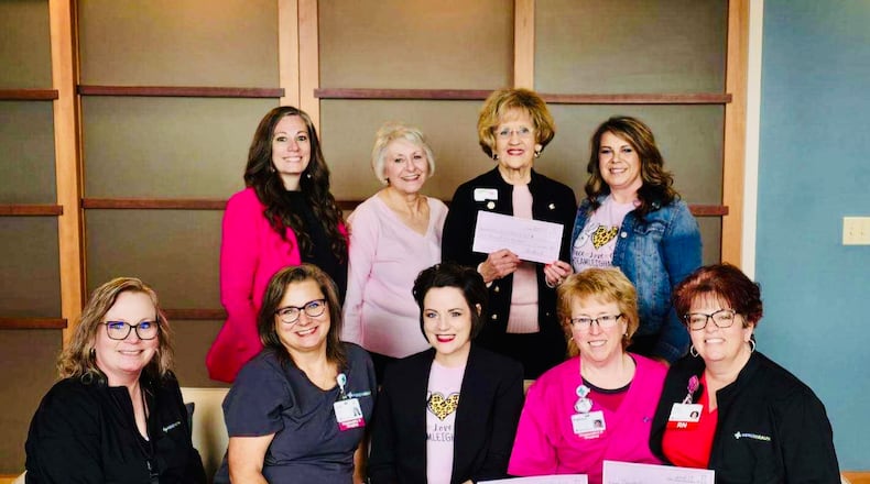 Leigh Anne Lawrence (middle, on couch) founded the Think Pink Gala to raise awareness for breast cancer and support those facing the diagnosis. COURTESY OF LEIGH ANNE LAWRENCE