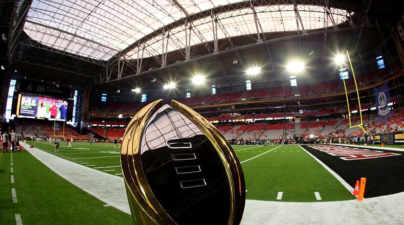 GLENDALE, AZ - JANUARY 11: The College Football Playoff National Championship Trophy is seen on the field before the 2016 College Football Playoff National Championship Game between the Clemson Tigers and the Alabama Crimson Tide at University of Phoenix Stadium on January 11, 2016 in Glendale, Arizona. (Photo by Ronald Martinez/Getty Images)