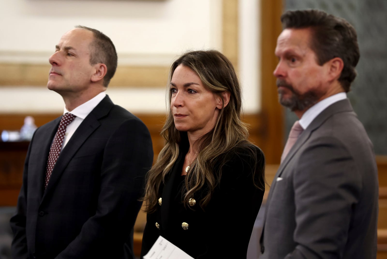 Karen Read with her attorneys David Yannetti, left, and Alan Jackson during jury selection in the murder trial of Read at Norfolk Superior Court, Tuesday, April 15, 2025, in Dedham, Mass. Read is accused of striking her boyfriend, Boston police officer John O’Keefe, with her SUV and leaving him to die in a snowstorm in 2022. (Nancy Lane/The Boston Herald via AP, Pool)
