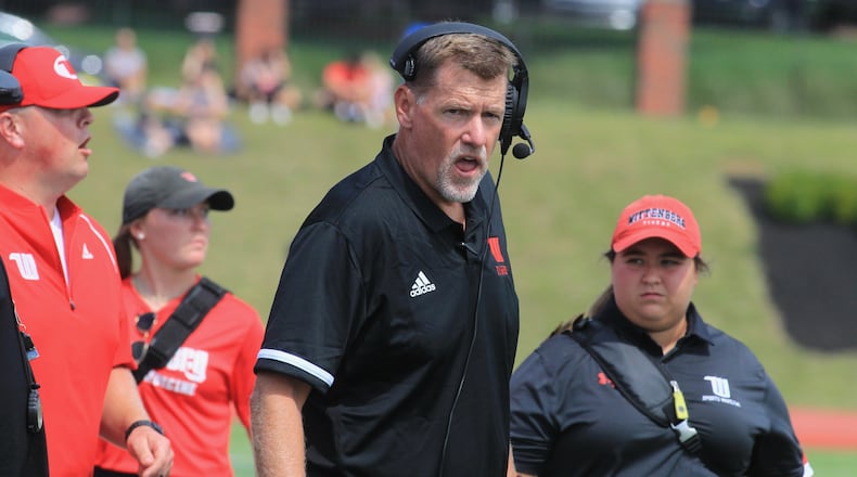 Wittenberg's Joe Fincham coaches during a game against SUNY Cortland on Saturday, Sept. 4, 2021, at Edwards-Maurer Field in Springfield. David Jablonski/Staff