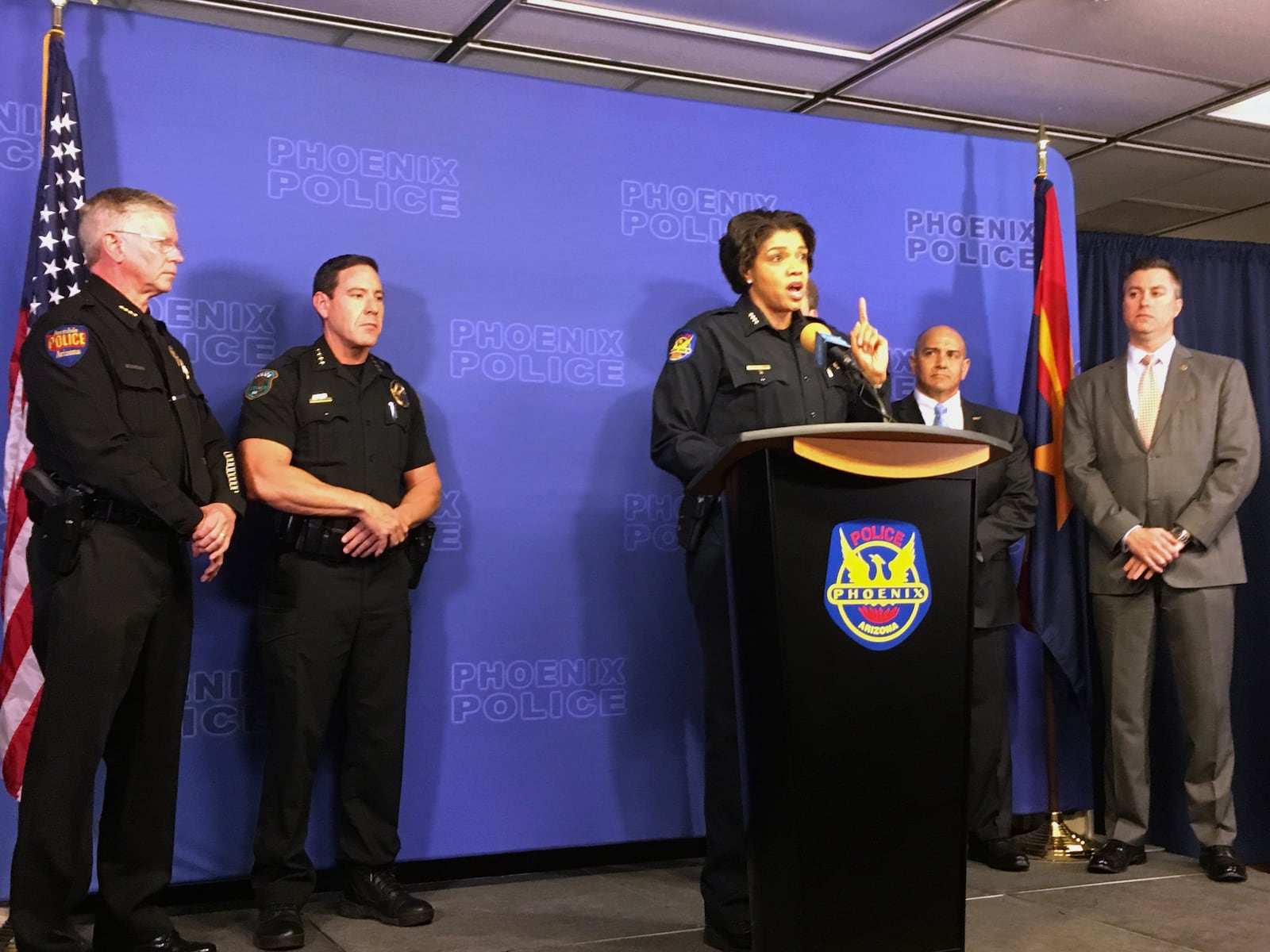 FILE - Phoenix Police Chief Jeri Williams speaks at a news conference about the linking of nine homicides to a convicted felon on Jan. 18, 2018, in Phoenix, Ariz. (AP Photo/Terry Tang, File)
