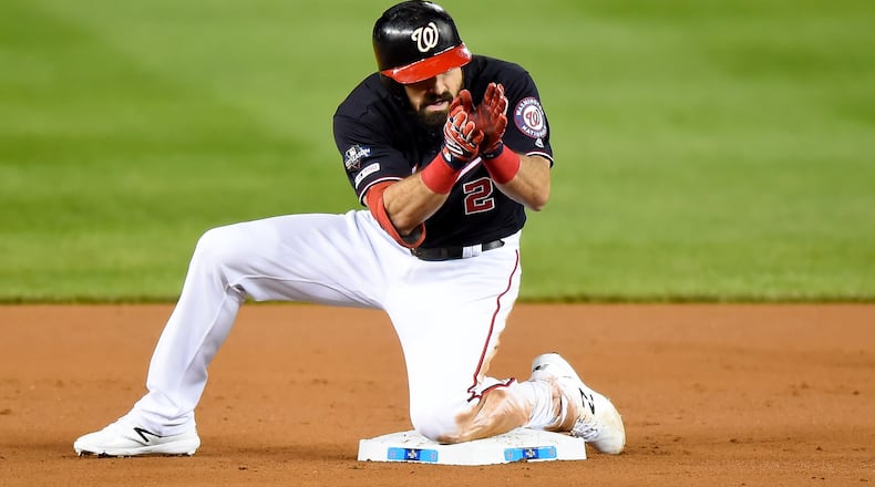 The Nationals’ Adam Eaton celebrates after hitting a double against the St. Louis Cardinals in the first inning of Game Four of the National League Championship Series at Nationals Park on October 15, 2019 in Washington, DC. (Photo by Will Newton/Getty Images)