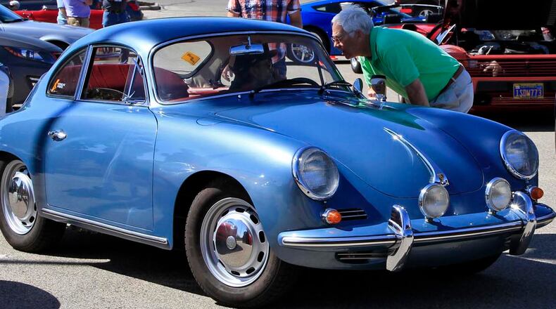 Bill Myers pulls out in his Porsche 356 at Cars & Coffee. 
© 2014 Photograph by Skip Peterson