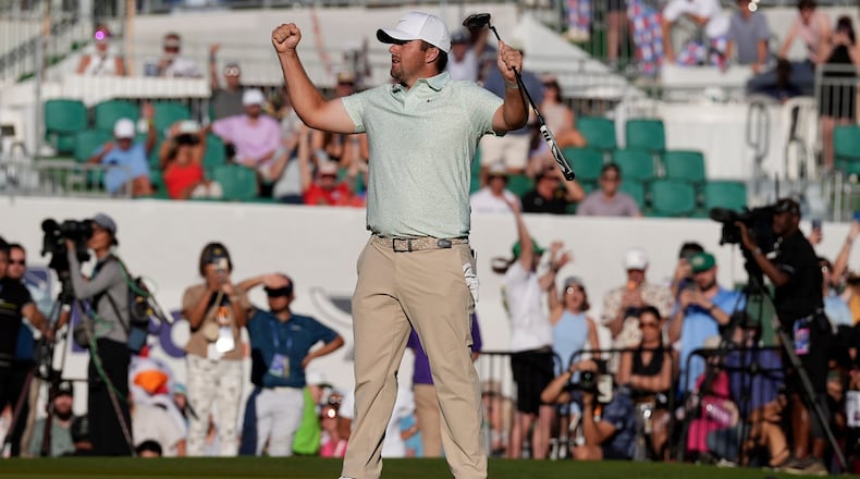 Chris Gotterup celebrates his win after sinking a birdie putt on the first playoff hole at the 18th green during the final round of the Phoenix Open golf tournament Sunday, Feb. 8, 2026, in Scottsdale, Ariz. (AP Photo/Ross D. Franklin)
