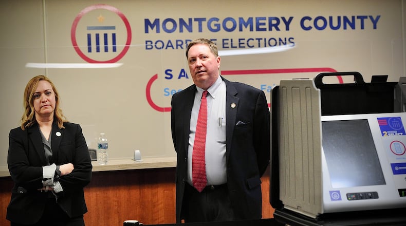 Sarah Greathouse, Montgomery County Board of Elections Deputy Director and Jeff Rezabek Montgomery County Board of Elections Director, answers questions from the media during an open house Wednesday, March 23, 2022. MARSHALL GORBY\STAFF