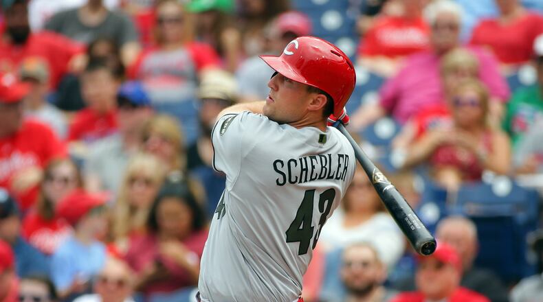 PHILADELPHIA, PA - MAY 28: Scott Schebler #43 of the Cincinnati Reds hits a solo home run in the second inning during a game against the Philadelphia Phillies at Citizens Bank Park on May 28, 2017 in Philadelphia, Pennsylvania. (Photo by Hunter Martin/Getty Images)