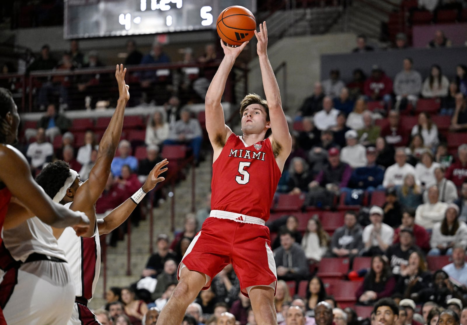 Miami Ohio guard Peter Suder (5) shoots in the first half of an NCAA college basketball game against UMass, Tuesday, Feb. 17, 2026, in Amherst, Mass. (AP Photo/Jessica Hill)