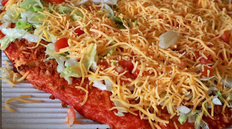 A fresh Taco Pizza from Short Stop Italian Restaurant. BILL LACKEY/STAFF