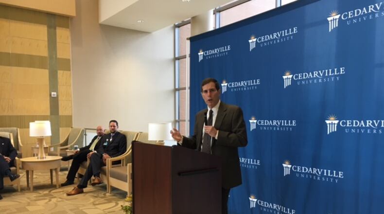 Jeffrey Haymond, dean of Cedarville’s School of Business Administration, at Thursday’s press conference. THOMAS GNAU/STAFF