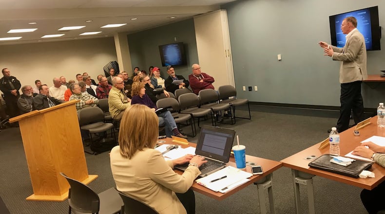 Clark County commissioner Rick Lohnes, left, talks to residents about a proposed tax assessment that will pay for a $4 million consolidated dispatch center. MICHAEL COOPER/STAFF